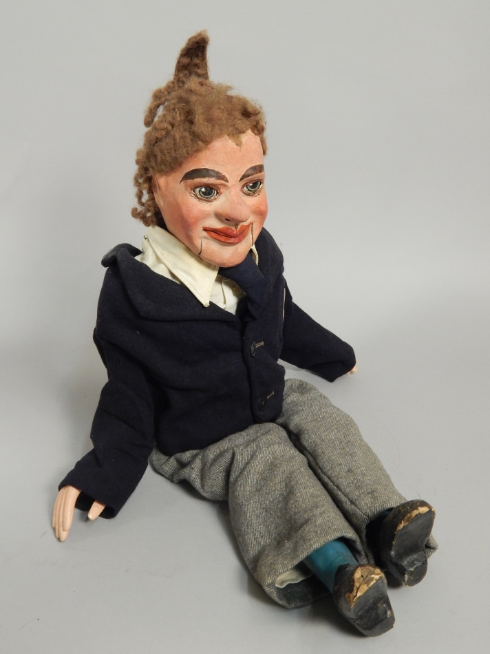 Appraisal: A mid thC ventriloquist dummy with a papier mache head