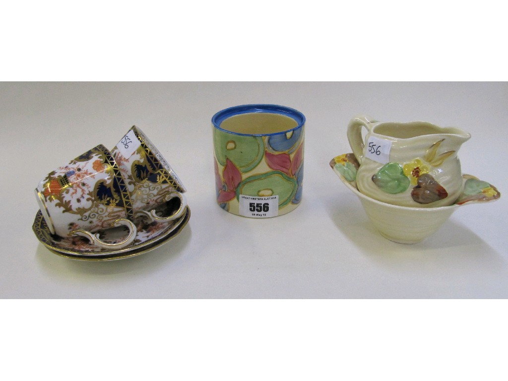 Appraisal: Two Royal Crown Derby cups and saucers no Clarice Cliff