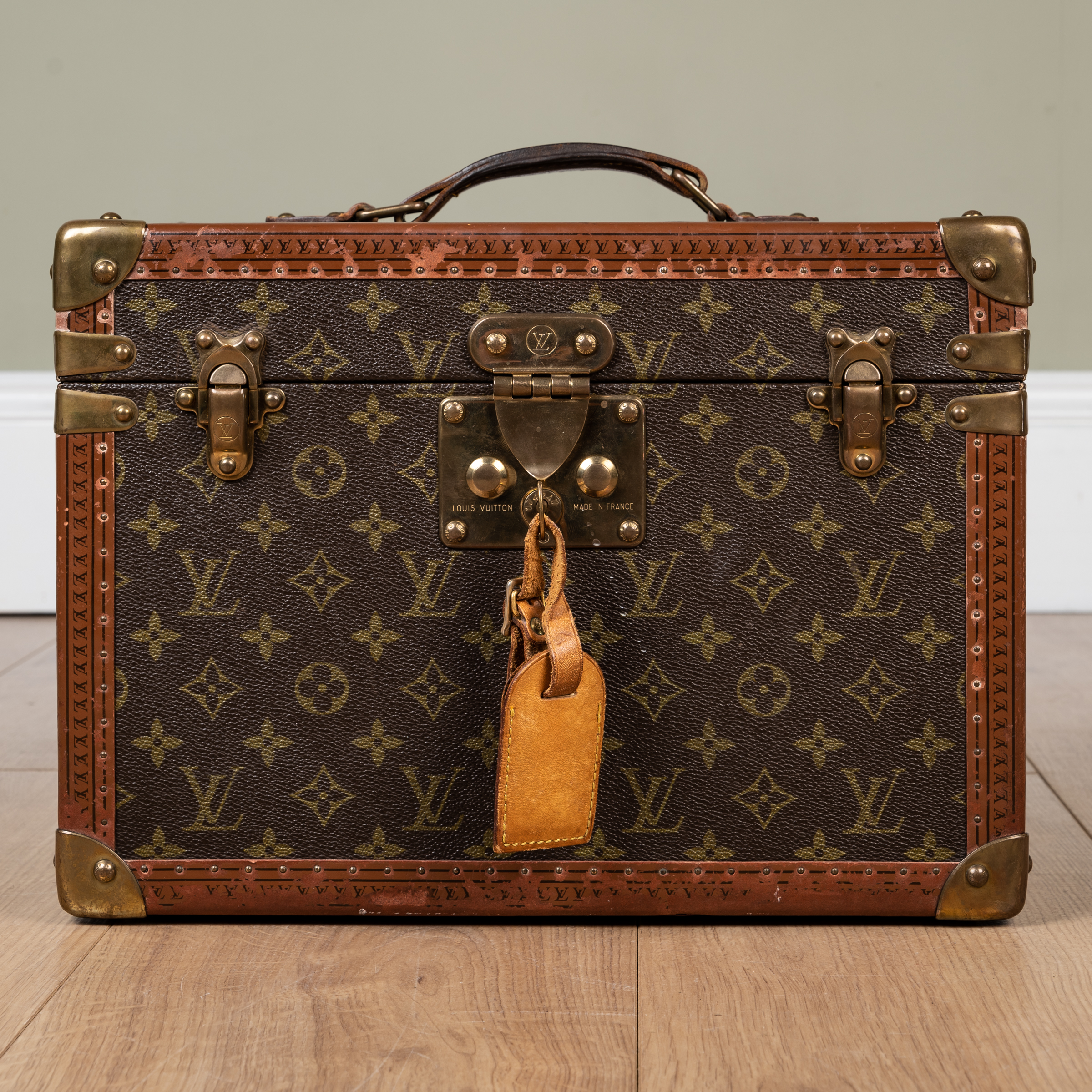 Appraisal: A Louis Vuitton initial monogrammed vanity case with brass metal