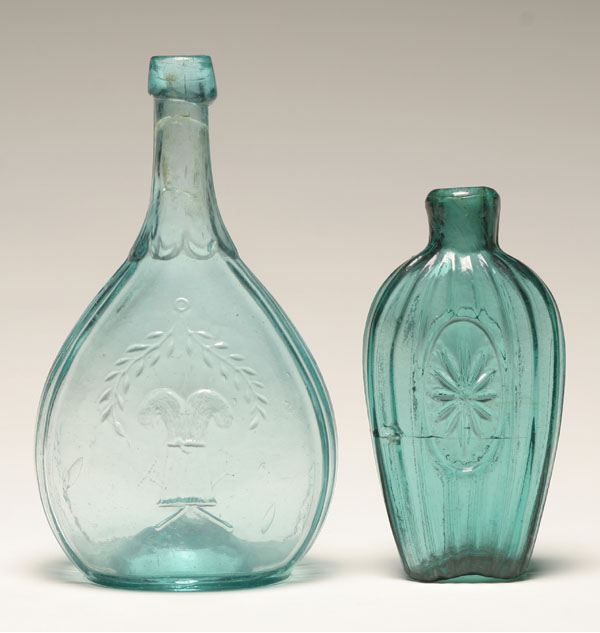 Appraisal: Early mold blown glass bottles Tallest H Crack in body