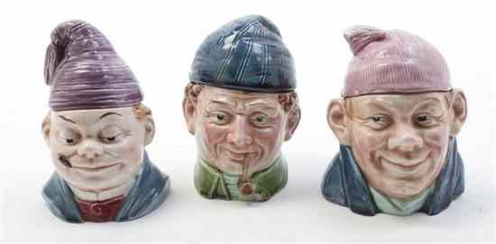 Appraisal: Three Ceramic Figural Tobacco Jars each depicting a gentleman in