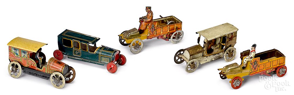 Appraisal: Five tin lithograph truck penny toys Five tin lithograph truck