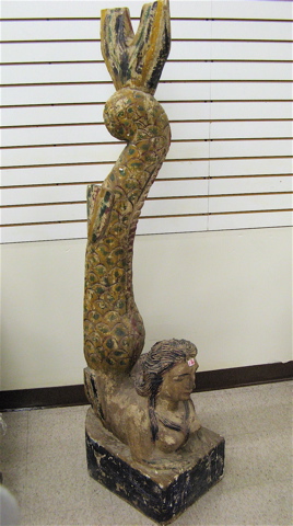 Appraisal: A CARVED AND PAINTED WOOD MERMAID FIGUREHEAD featured in inverted