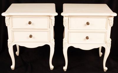 Appraisal: A pair of painted bedside tables each fitted two drawers