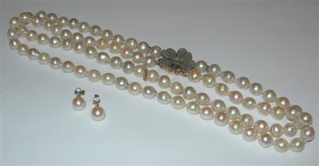 Appraisal: An Edwardian cultured pearl two-row necklace composed of off-round pearls