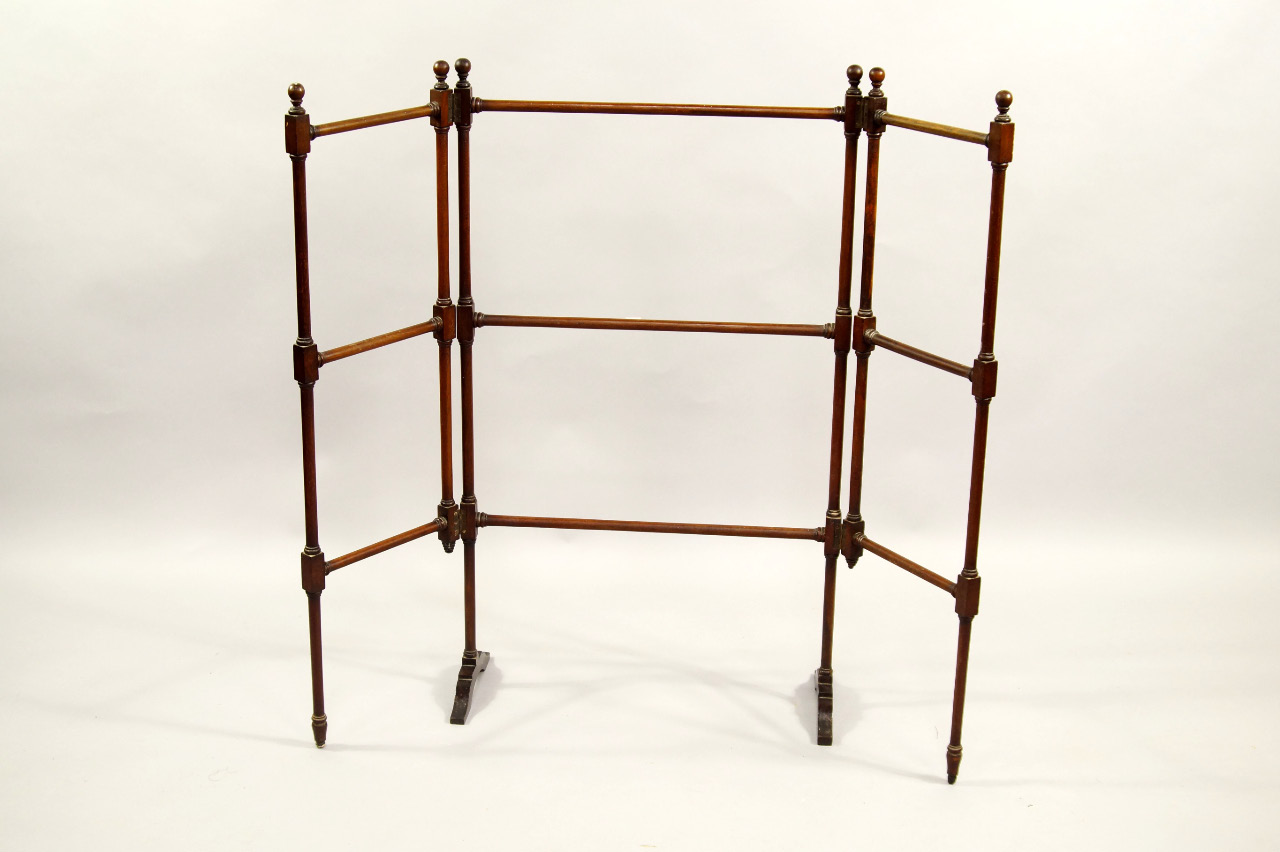 Appraisal: A late Victorian mahogany folding towel rail with slender supports