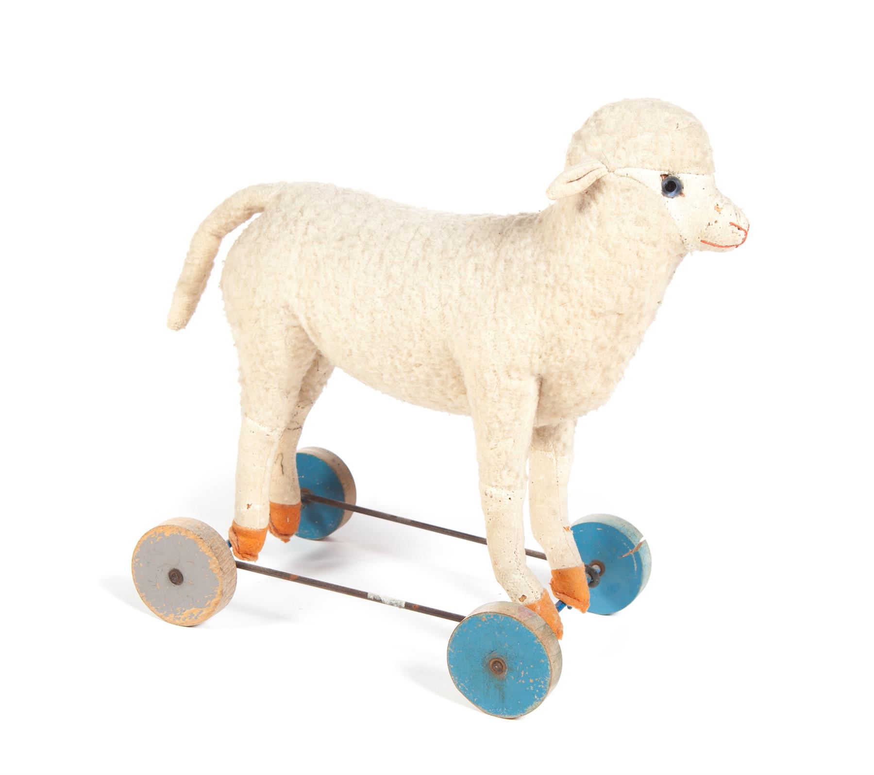 Appraisal: TWO PULL TOYS Possibly European Lamb with a furry wool