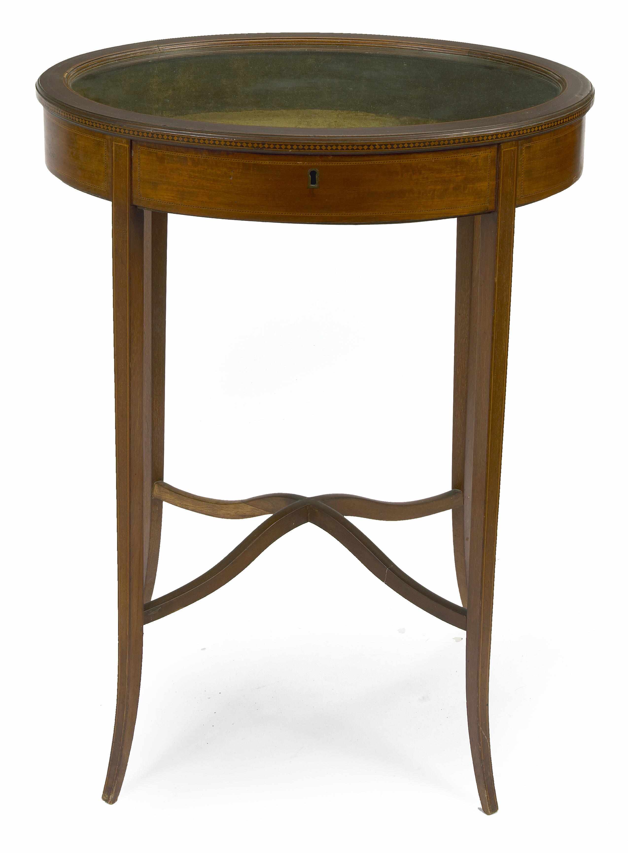 Appraisal: An Edwardian inlaid mahogany bijouterie table circa height in width