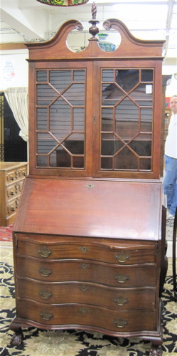 Appraisal: CHIPPENDALE STYLE MAHOGANY SECRETARY BOOKCASE American mid- th century in