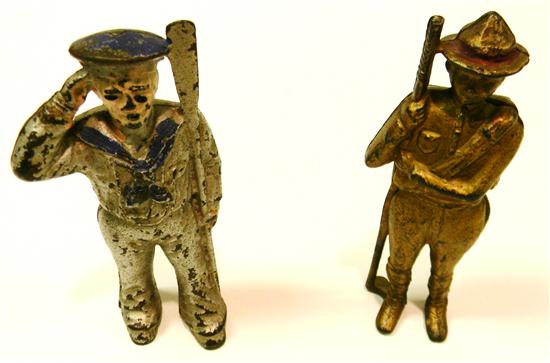 Appraisal: Two cast iron still banks Hubley saluting sailor with oar