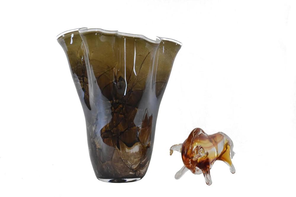 Appraisal: The first a colorless glass bull with internal amber coloring