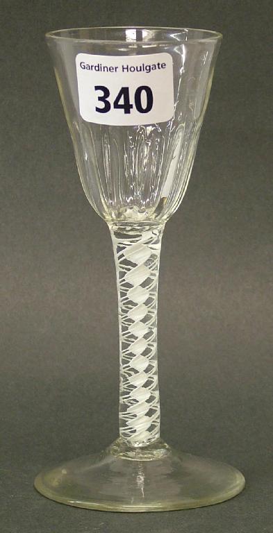 Appraisal: Wine glass with fluted funnel bowl and opaque air twist