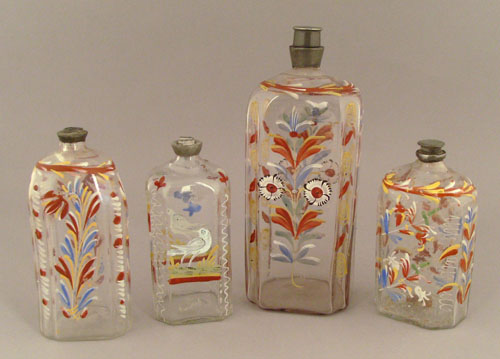 Appraisal: Four colorless glass flasks mid th c with enamel decoration