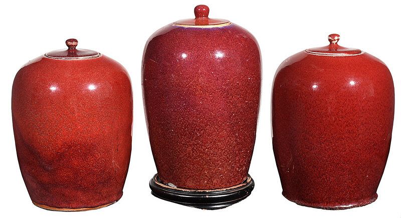 Appraisal: Three Chinese Sang de Boeuf Lidded Jars Qing dynasty lidded