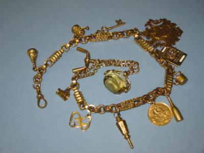 Appraisal: A VICTORIAN CT GOLD ALBERT the fancy links hanging with