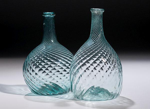 Appraisal: TWO BLOWN MIDWESTERN BOTTLES attributed to Zanesville Ohio ca -