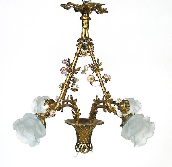 Appraisal: A pair of four light gilt bronze and porcelain chandeliers