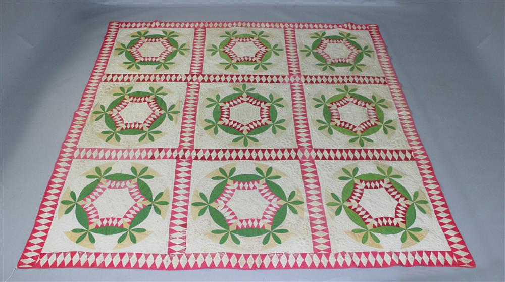 Appraisal: TWO ANTIQUE QUILTS INCLUDING A PIECED AND AN APPLIQUED QUILT