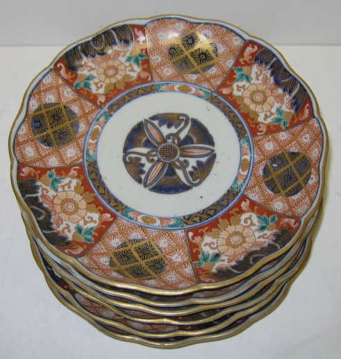 Appraisal: SIX JAPANESE PORCELAIN PLATES Scalloped edge decorated blue underglaze and