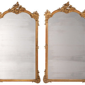 Appraisal: A Pair of Rococo Style Giltwood Mirrors th Century Height