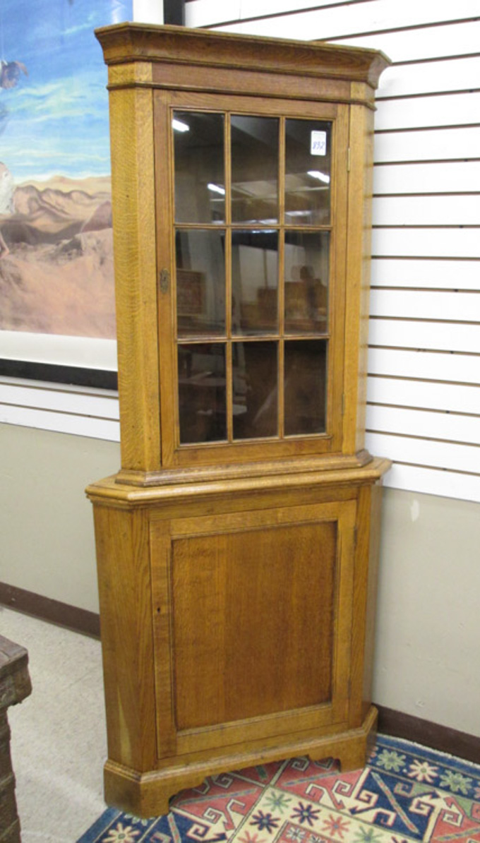 Appraisal: AN OAK CORNER CABINET English c in two sections top