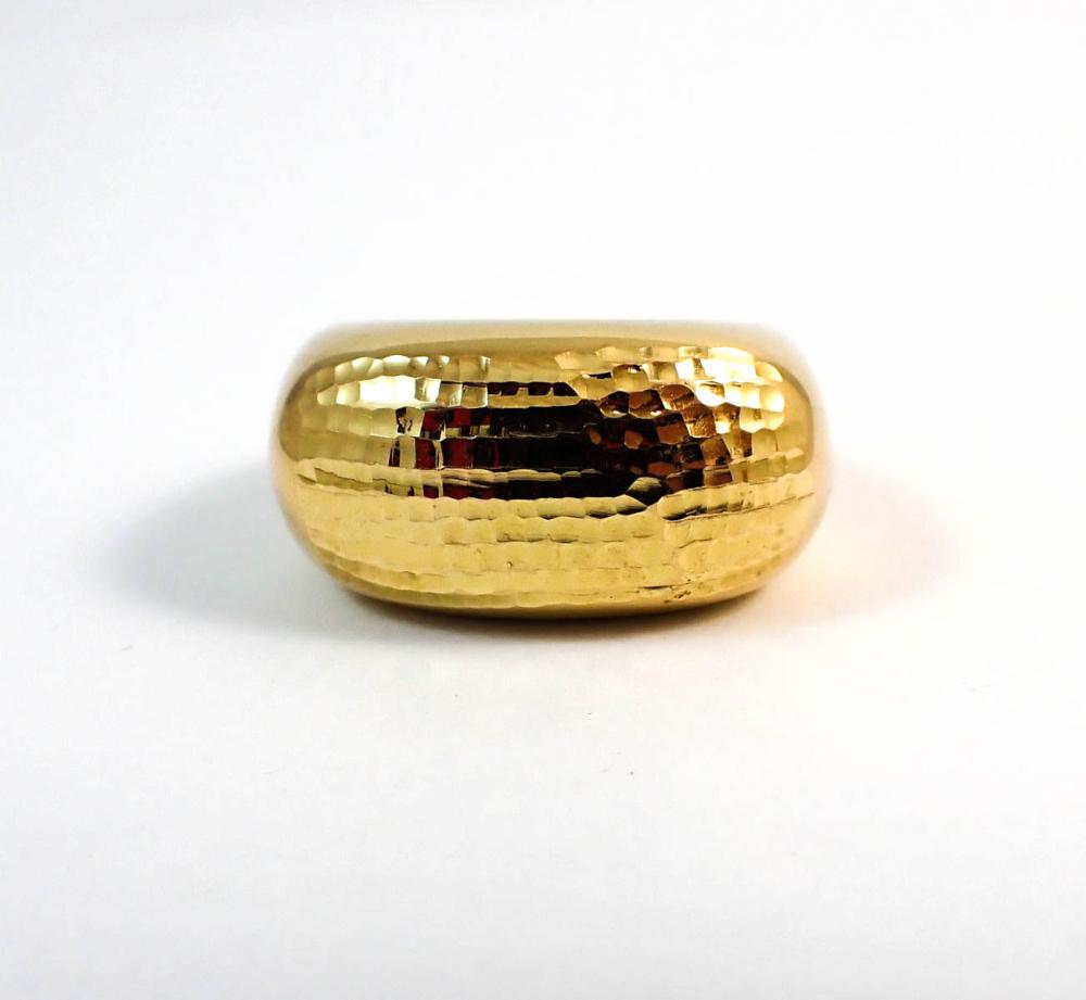 Appraisal: ITALIAN MADE FOURTEEN KARAT GOLD RING having a textured yellow