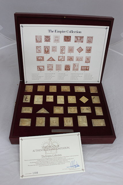 Appraisal: A FRANKLIN MINT EMPIRE COLLECTION SILVER PRESENTATION STAMP SET in