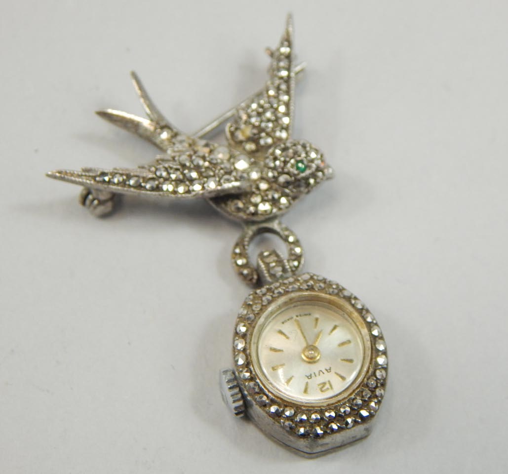 Appraisal: A mid thC Aviam marcecite and silver brooch watch headed