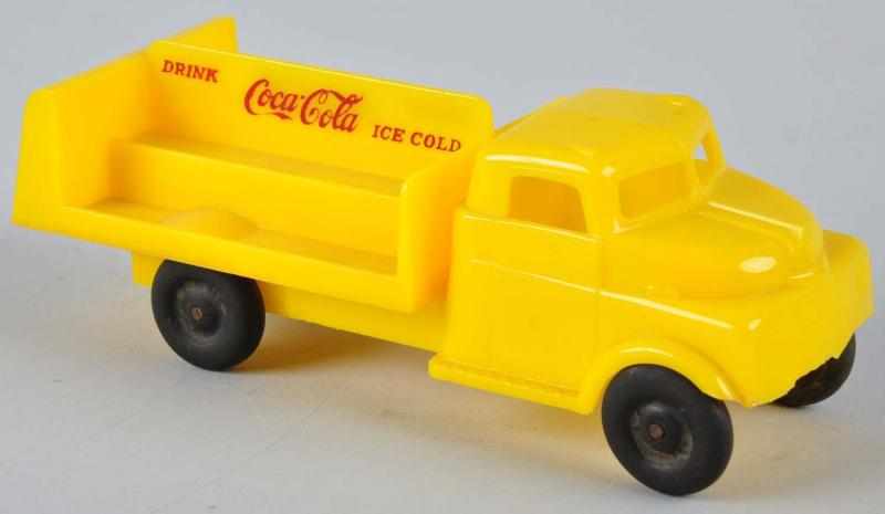 Appraisal: s Plastic Coca-Cola Truck Toy Description Rubber wheel version in