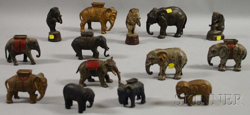 Appraisal: Fourteen Cast Iron Elephant Figural Still Banks most with paint