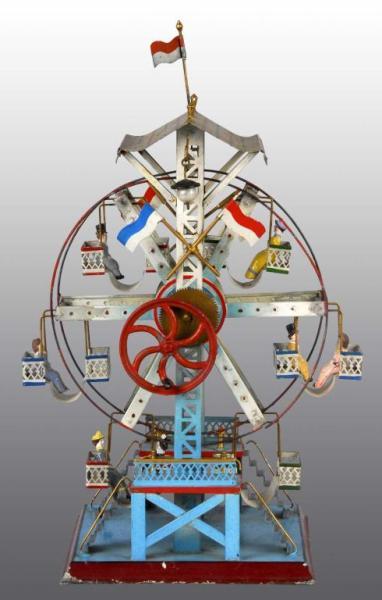 Appraisal: Tin Hand-Painted Steam-Driven Ferris Wheel Toy Description German Made by