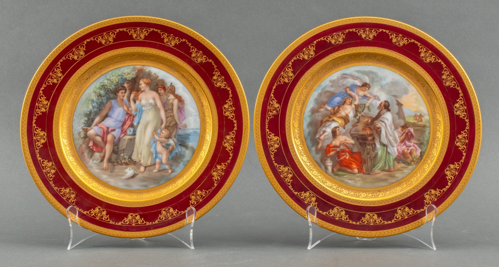 Appraisal: ROYAL VIENNA STYLE DECORATIVE PORCELAIN PLATES Two Royal Vienna style