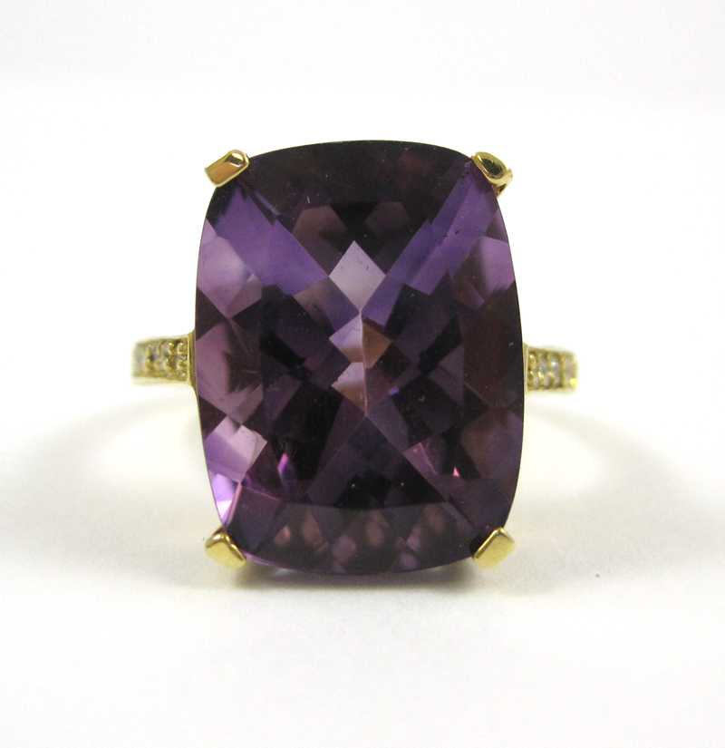 Appraisal: AMETHYST AND DIAMOND KARAT YELLOW GOLD RING the cushion shaped