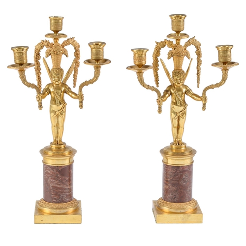 Appraisal: A pair of French ormolu candelabra th c of three