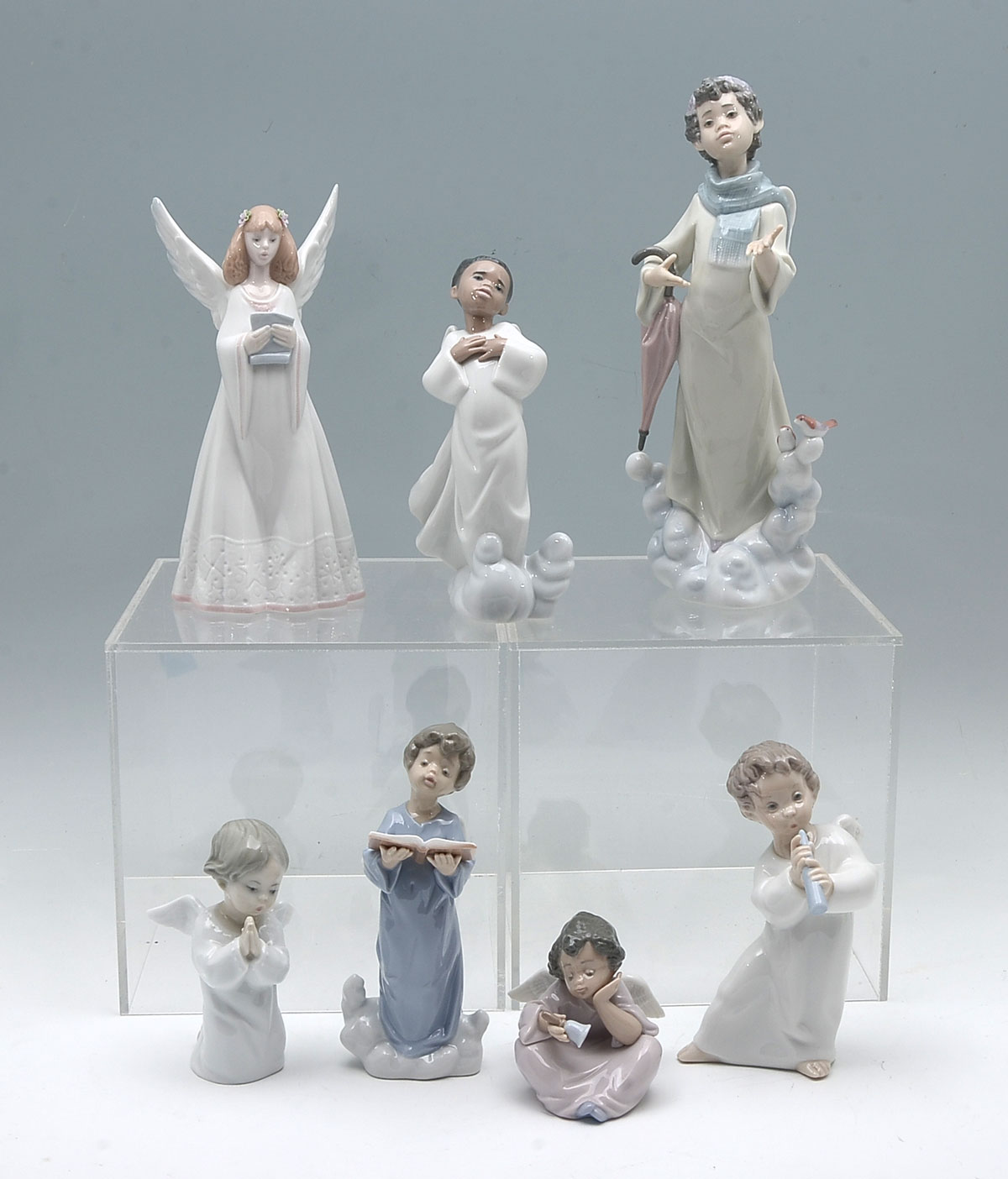 Appraisal: LLADRO ANGELS Little Angel Kneeling in Prayer Angel on a