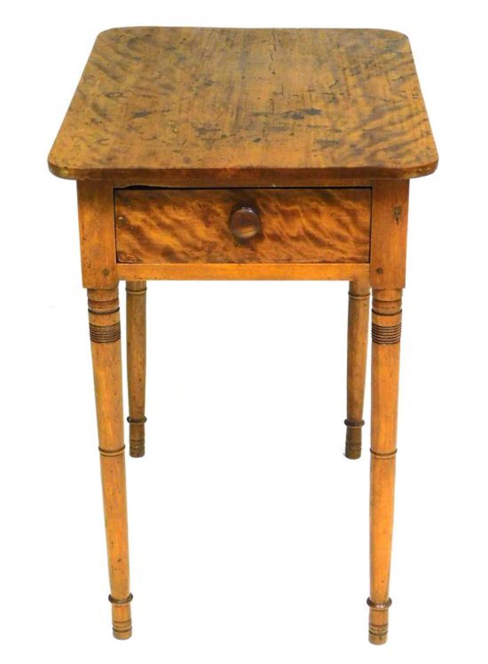 Appraisal: Single drawer stand American th C flamed birch oblong top