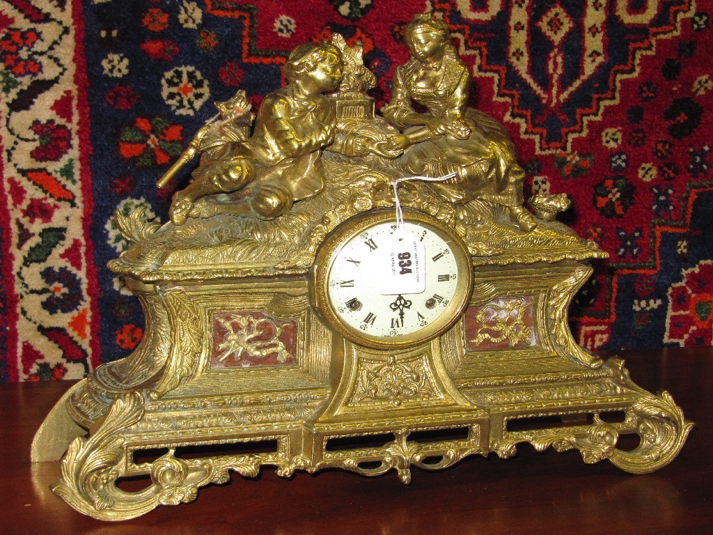 Appraisal: Brass figural mantel clock