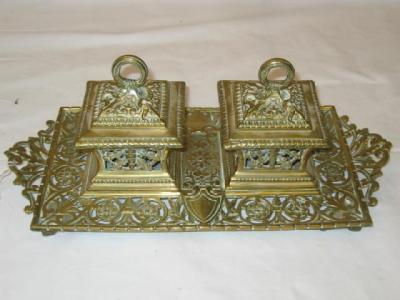 Appraisal: A VICTORIAN BRASS INKSTAND of oblong form with pierced foliate