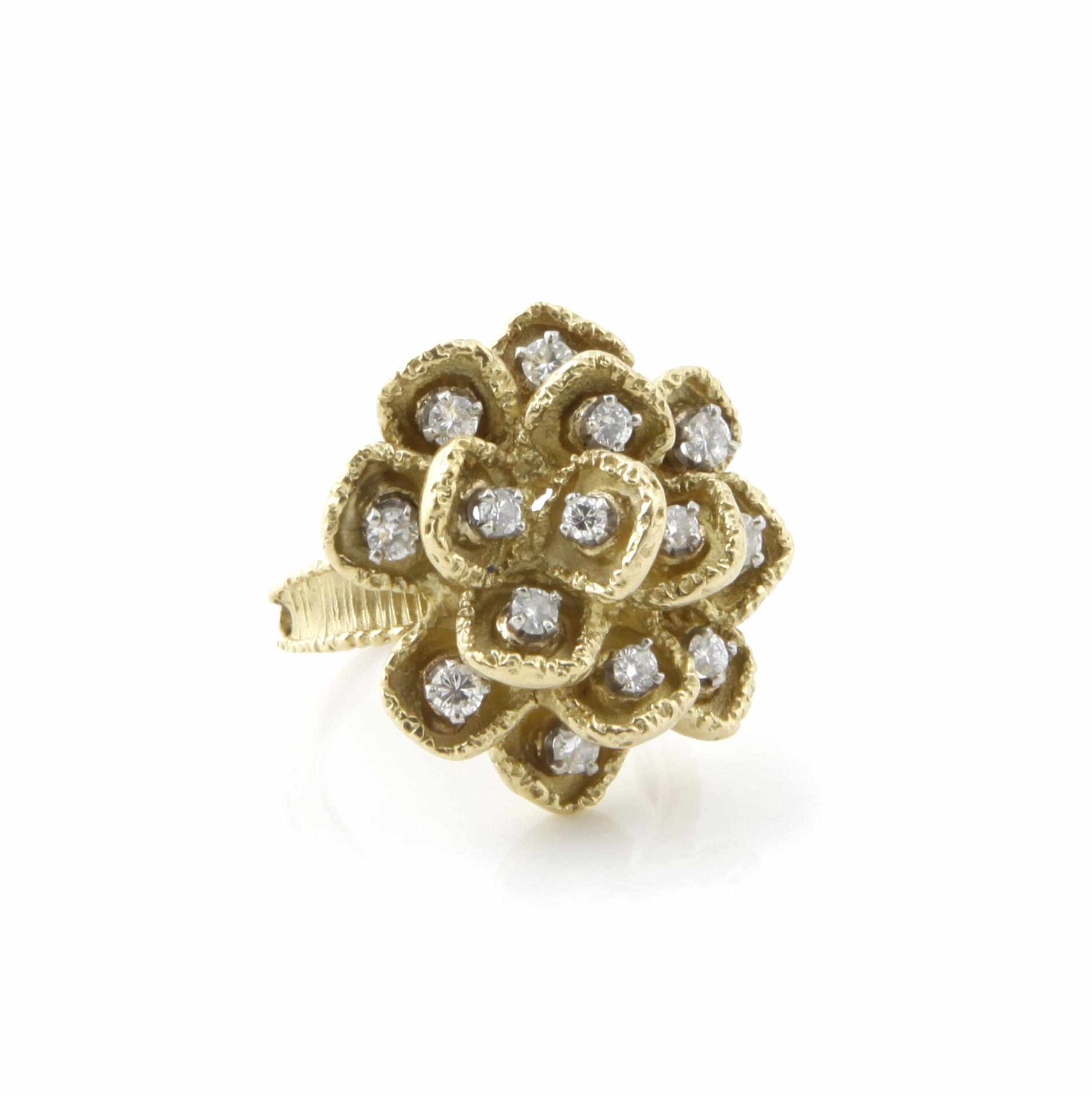 Appraisal: A diamond and k gold flower ring maker's mark for