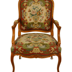 Appraisal: A Louis XV Style Carved Mahogany Fauteuil TH CENTURY Property