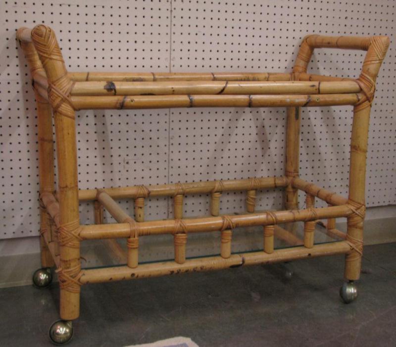 Appraisal: Vintage Rattan Tea Cart with Glass Top on casters