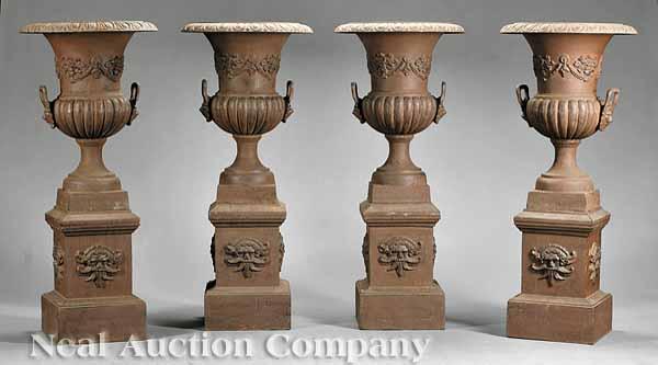 Appraisal: A Set of Four Neoclassical-Style Cast Iron Campagna Urns on