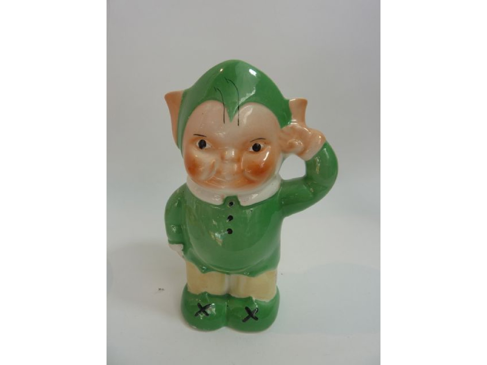 Appraisal: A Shelley jug modelled as a pixie Booboo Bobo saluting