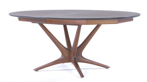 Appraisal: VLADIMIR KAGAN Walnut round pedestal extension dining table with two