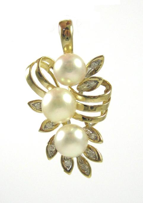 Appraisal: PEARL DIAMOND AND FOURTEEN KARAT GOLD PENDANT set with three