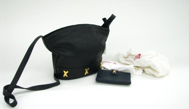 Appraisal: Paloma Picasso signature triple ''X'' black leather cross body bucket