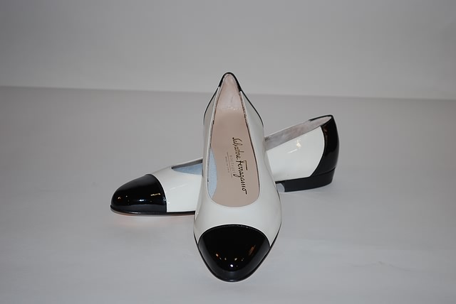 Appraisal: Salvatore Ferragamo navy and white calf pumps Size - C