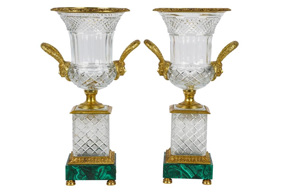 Appraisal: PAIR OF BACCARAT STYLE CUT CRYSTAL URNSwith bronze mounts on