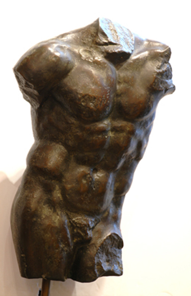 Appraisal: A CLASSICALLY STYLED BRONZE BUST The male torso raised on