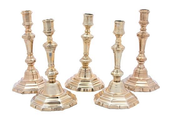 Appraisal: Five Continental Brass Candlesticks Five Continental Brass Candlesticks TH CENTURY